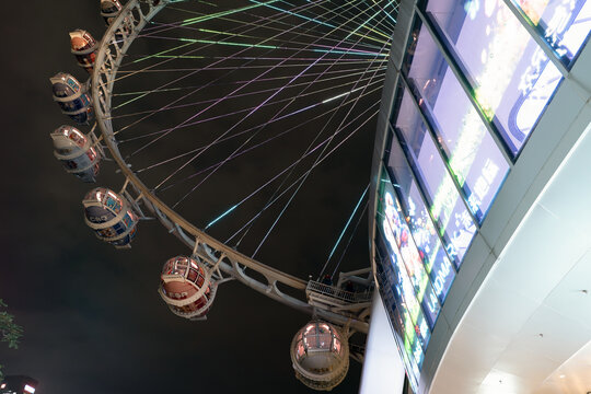 Cabins of The Bay Glory observation wheel at night