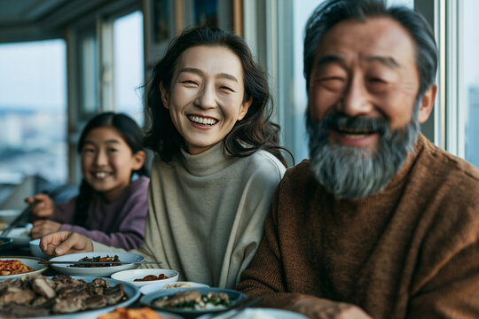 Happy Multigenerational Asian Family Having Dinner Together