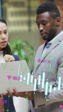 Animation of multiple graphs with changing numbers, diverse coworkers discussing reports on laptop