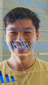 Animation of multiple graphs with changing numbers over close up of smiling asian man