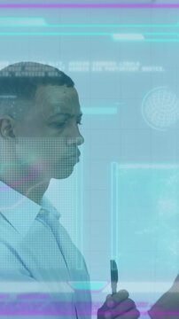 Animation of data processing over african american businessman in office