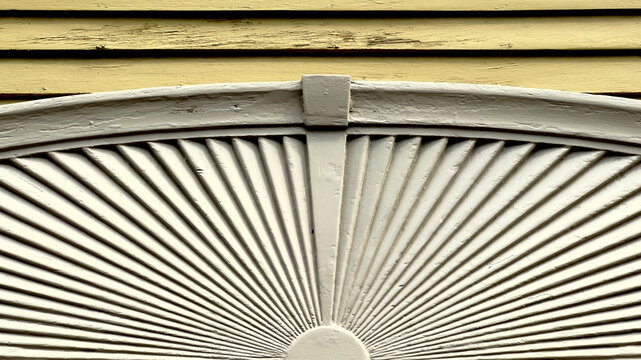 Elliptical Sunburst Pediment with Central Keystone Block