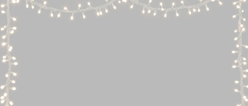 Gold LED string lights, Garlands border overlay. Festive fairy light frame on transparent background PNG. Bright string lights with realistic luminous bulbs