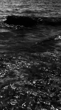 A serene black and white  of a body of water, perfect for use in editorial or commercial contexts