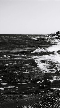 A serene ocean scene captured in monochrome tones