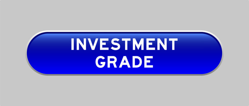 Blue color capsule shape button with word investment grade on gray background