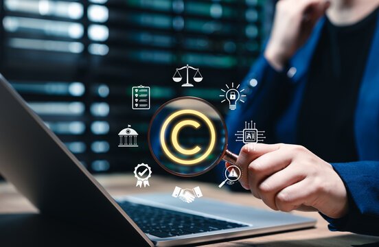 Patented intellectual property. Digital copyright or patent concept. Woman holding magnifying glass focuses on copyright symbol surround by legal icons. trademark license, Author rights, law business,