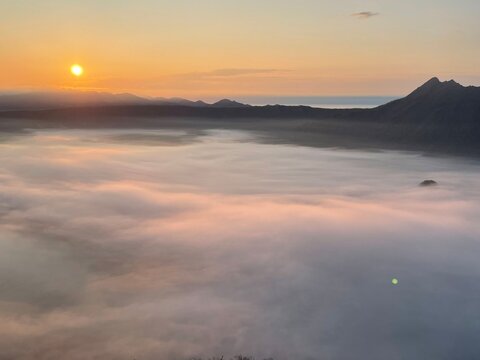 Sunrise over a sea of clouds at Lake Mashu, Hokkaido, Japan