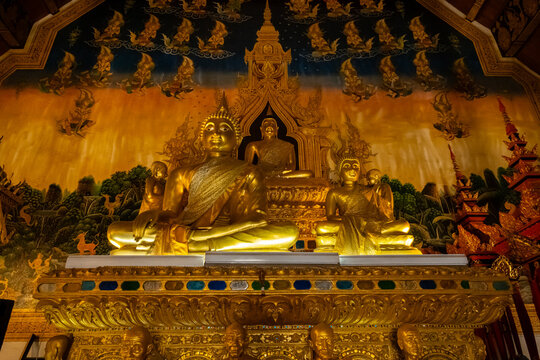 Golden Naga sculptures at Wat Sri Panton in Nan Province, Thailand, showcasing ornate Buddhist architecture, sacred craftsmanship and Northern Lanna heritage