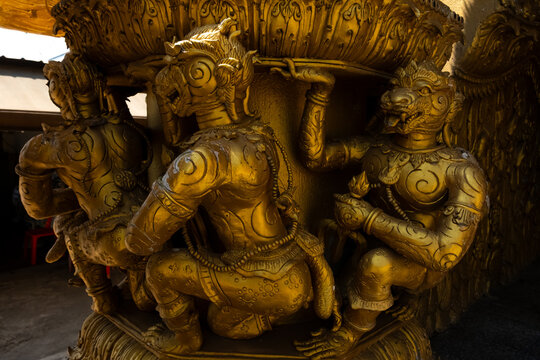 Golden Naga sculptures at Wat Sri Panton in Nan Province, Thailand, showcasing ornate Buddhist architecture, sacred craftsmanship and Northern Lanna heritage