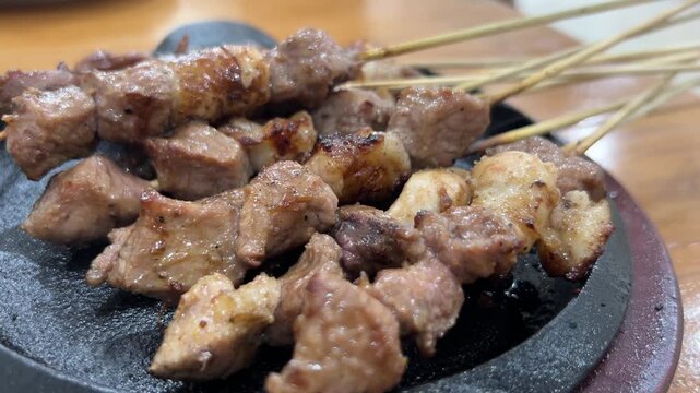 Freshly Grilled Mutton Satay Served On Hotplate With Steam