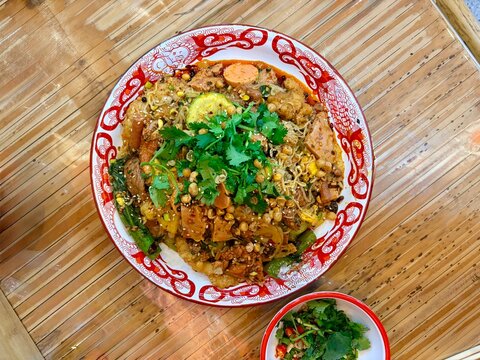 Colorful Asian Noodle Dish with Fresh Herbs and Vegetables