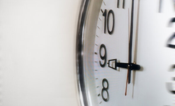 Clock showing nine o'clock deadline time concept