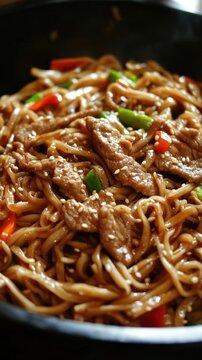 Delicious Asian Chow Mein Noodles with Beef and Herbs