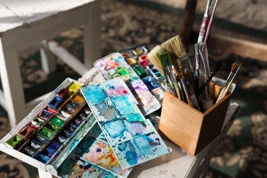 Watercolour artist supplies with palette and brushes