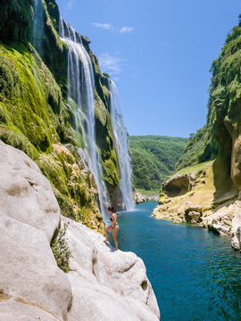 Blue sky above turquoise canyon