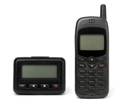 Pager And Vintage Mobile Phone Side By Side With Blank Screens And Retro Product Design