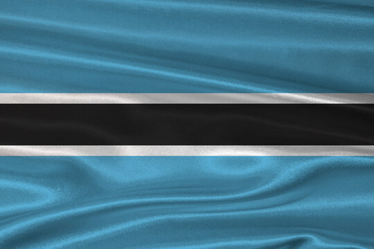 Botswanan flag textured with fabric background. Flag of Botswana with a soft fabric texture