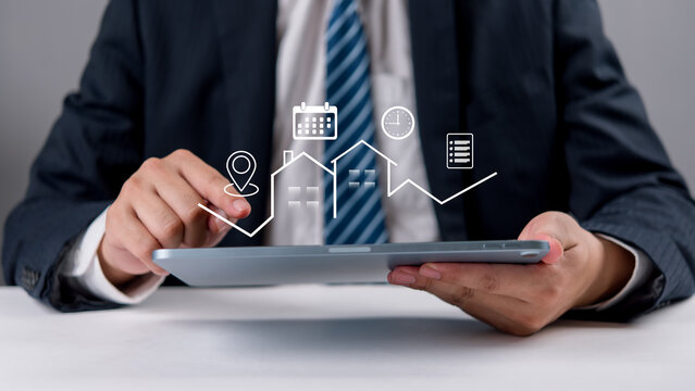 Real Estate Technology Concept With Digital Property Analytics Interface On Tablet Showing Housing Data Management And Smart Property Solutions