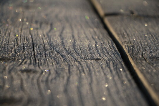 Frost-Covered Wooden Surface in Lake Sevan, Armenia