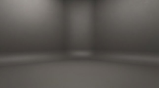 Empty dark grey studio room with seamless cyclorama wall and soft lighting, perfect for product photography or video shoots.