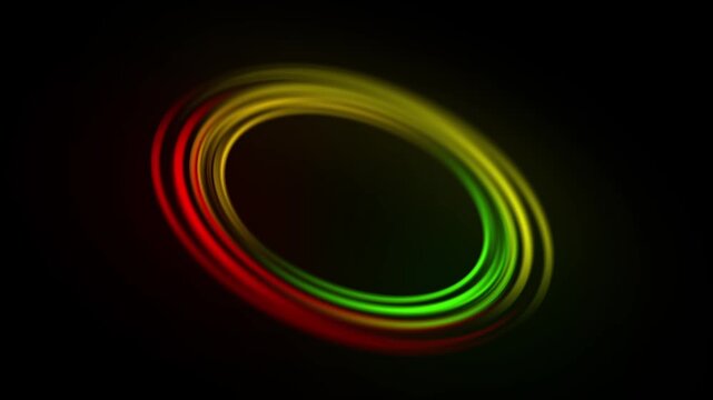 Abstract glowing light rings rotating in circular motion on black background dynamic neon circles