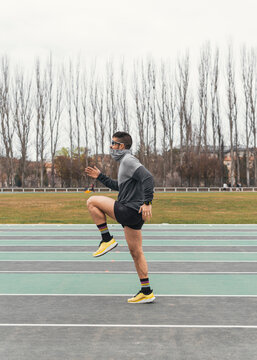 Athlete warm up on outdoor running track