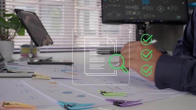 Business professional holding pen and reviewing document report with digital magnifying glass and checkmark hologram icons fading in on office desk, audit concept, data analysis, and quality assurance