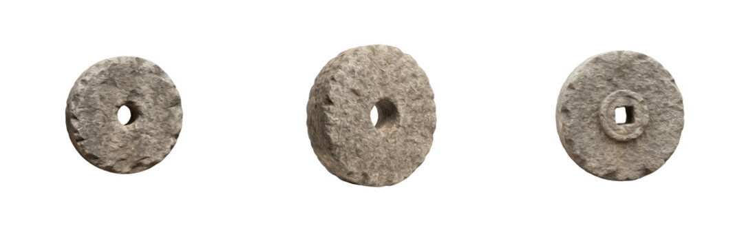 Set of antique stone millstones or grinding wheels with central axle holes isolated on white background for agriculture, history, and milling stock photography