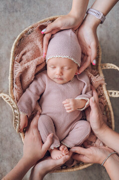 Family care for sleeping newborn during first days at home
