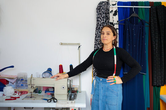 Tailor woman with her sewing machine