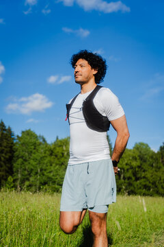 Athlete Stretching Leg Outdoors