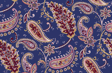 Seamless repeating pattern with paisley motifs placed at different angles, balanced by smaller floral elements and filler © Venkatsai