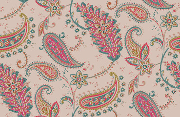 Seamless repeating pattern with paisley motifs placed at different angles, balanced by smaller floral elements and filler © Venkatsai