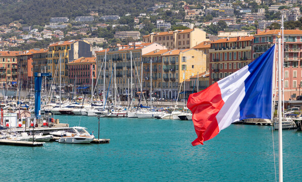 French flag over Nice marina on the cote d&rsquo;Azur coast