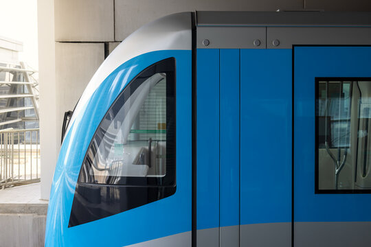 Dubai Metro train stationed at a modern platform in UAE
