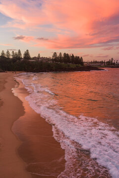 Sunset over Kendalls Beach shoreline in Kiama, Australia