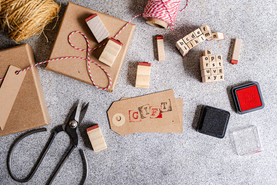 Craft gift wrapping supplies with handmade paper tag