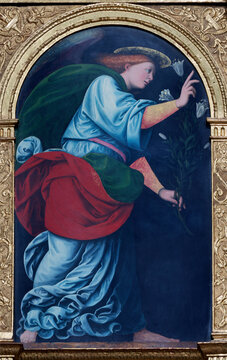 Novara - The renaissance painting of Garbiel (Annunciation - part of polyptych) in the church Basilica di San Gaudenzio by Gaudenzio Ferrari (1514-1521).
