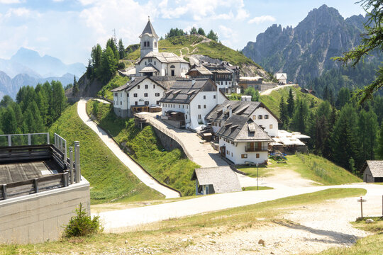 Monte Santo di Lussari mountain village and sanctuary near Tarvisio, Italy, surrounded by the dramatic peaks of the Julian Alps. Popular pilgrimage and alpine tourism destination.