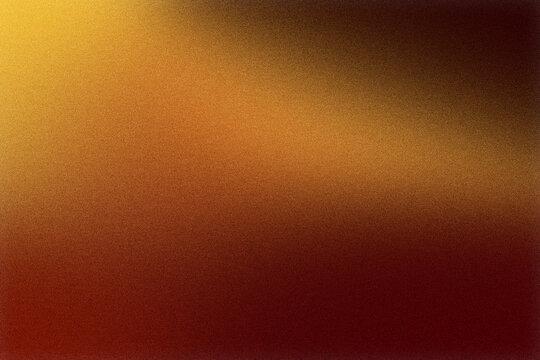 Grainy gradient texture blending warm orange, brown and red tones for an abstract background