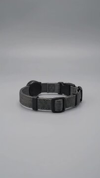 Minimalist grey smart pet collar with GPS tracker product animation, ai generated