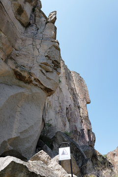 dangerous rock face with falling rocks