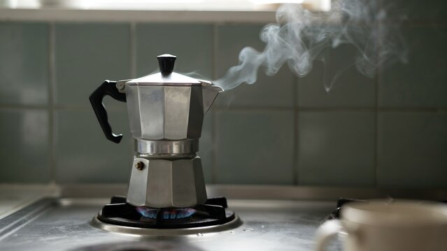 Steam Rising from Stovetop Espresso Maker in Modern Kitchen Setting