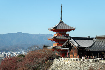 Naklejka premium Authentic Kiyomizu-dera Temple Three-Story Pagoda with Autumn Leaves in Early December, Kyoto