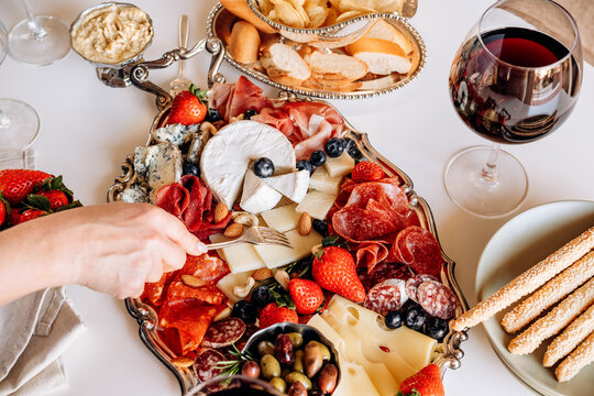 Elegant Charcuterie Board With Cheese, Cured Meats, Olives and Fresh Strawberries for Entertaining