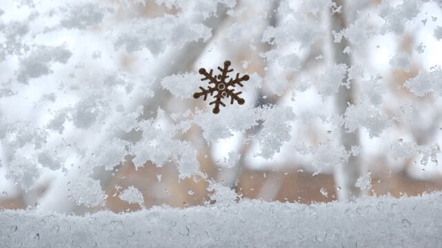 Frosty window, dreamy, coziness and tranquility. Atmosphere is calm and quiet, reflecting the peaceful stillness after a snowstorm. Frosty glass, fluffy snow, post-blizzard,  quiet winter,