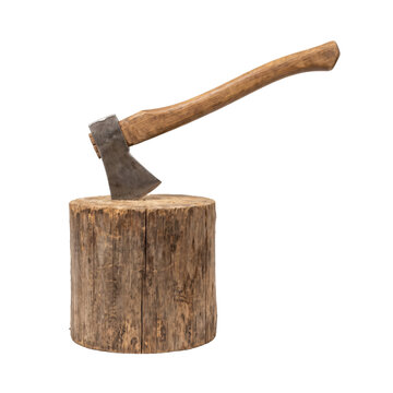 Old wooden chopping block with an axe embedded in it, ready for work
