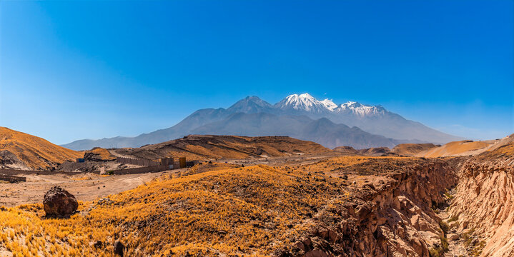 A view over the Culebrillas canyon with Chachani volcano as a backdrop close to Arequipa, Peru in the dry season