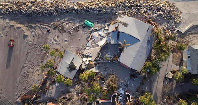 Destroyed house on ocean shore. Hurricane Milton consequences on Manasota Key, Florida. Storm surge severe damage.